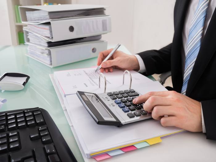 Bookkeeping and financial documents on a desk